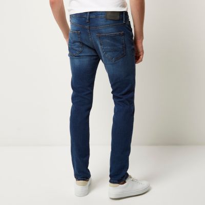 Mid blue wash ripped Sid skinny jeans